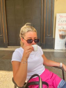 Erin sipping on an espresso in Italy